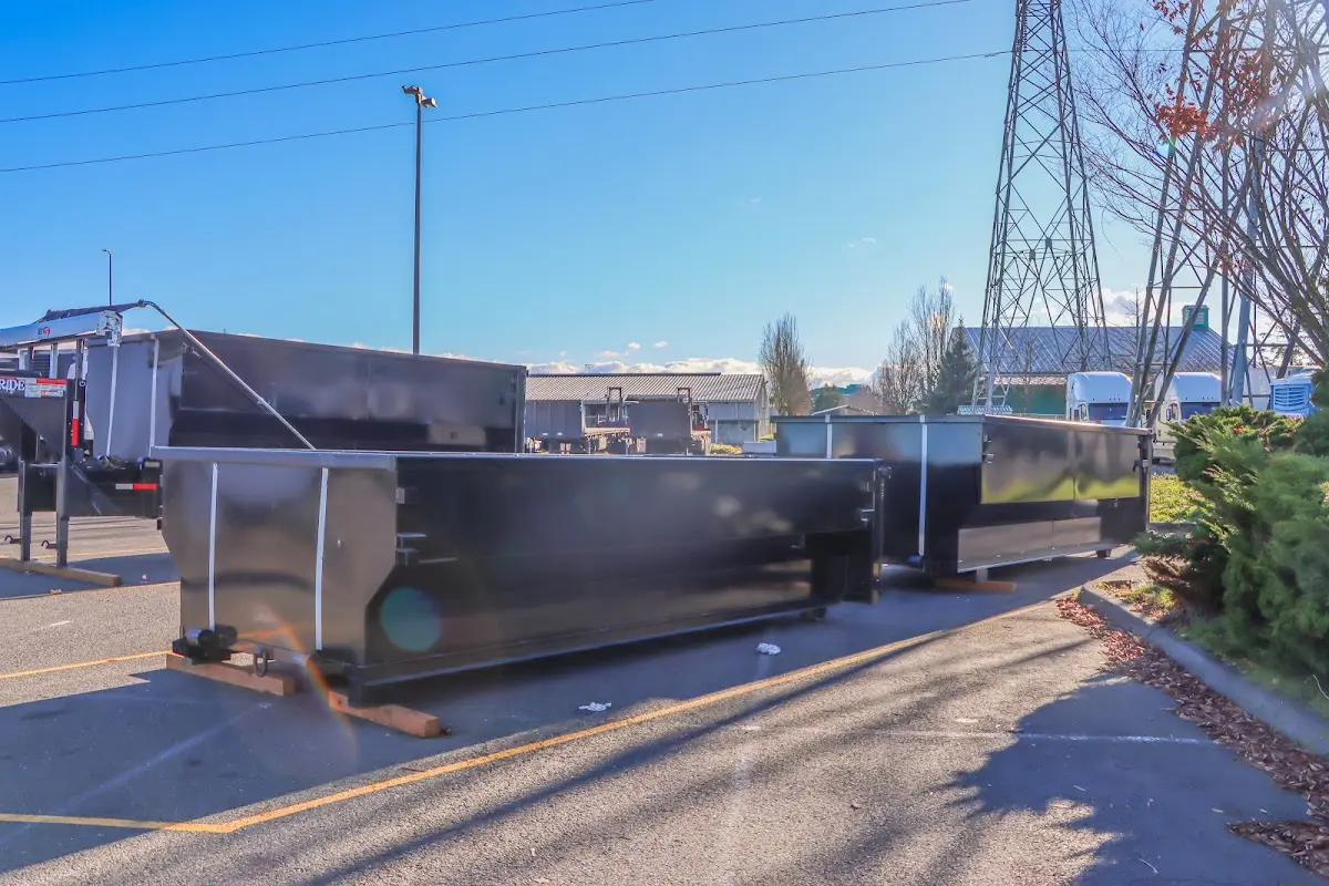 Roll-off dumpster ready for waste disposal at job site for Commercial Dumpster Rental in Cambridge